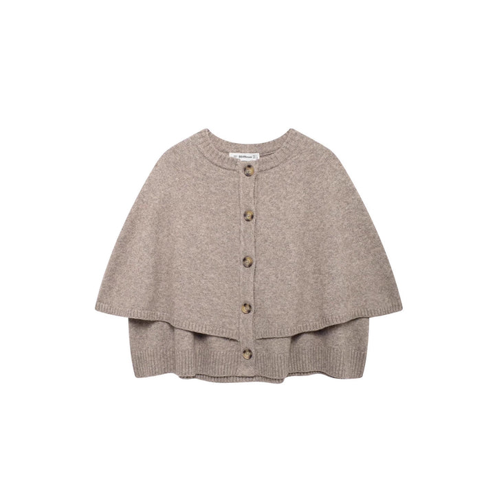 Damstickad poncho med knapppdetaljer Mirla-Eva Jonsson