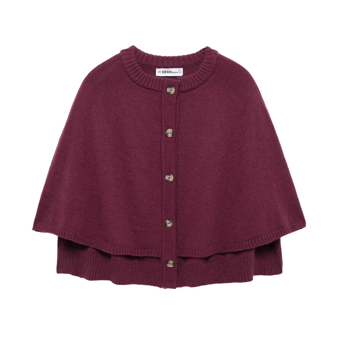 Damstickad poncho med knapppdetaljer Mirla-Eva Jonsson