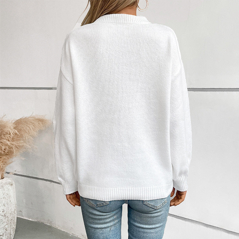 Damstickad tröja med flaggmotiv och rundhalsringning Mirla-Eva Jonsson