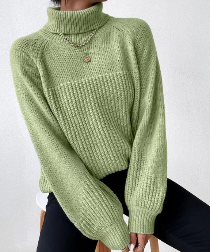 Damstickad tröja med högt krage och strukturerad ribbdesign Eva Jonsson-Eva Jonsson