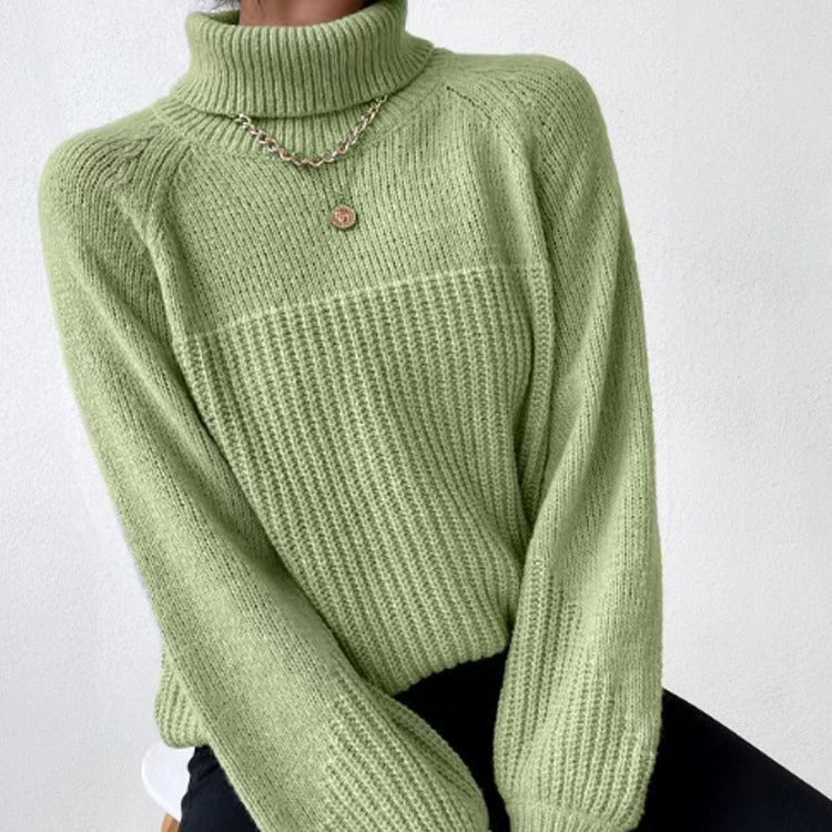 Damstickad tröja med högt krage och strukturerad ribbdesign Eva Jonsson-Eva Jonsson