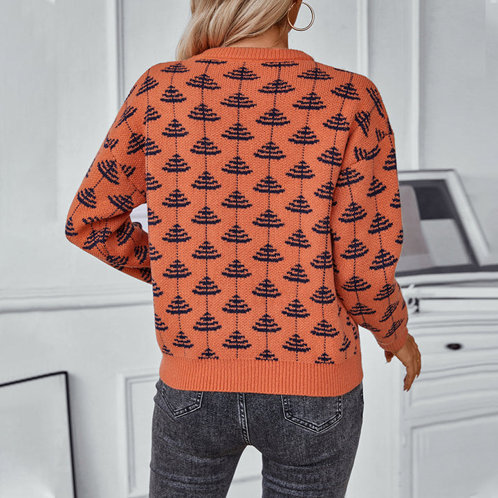 Damstickad tröja med lekfullt träddesign och mjukt material Mirla-Eva Jonsson