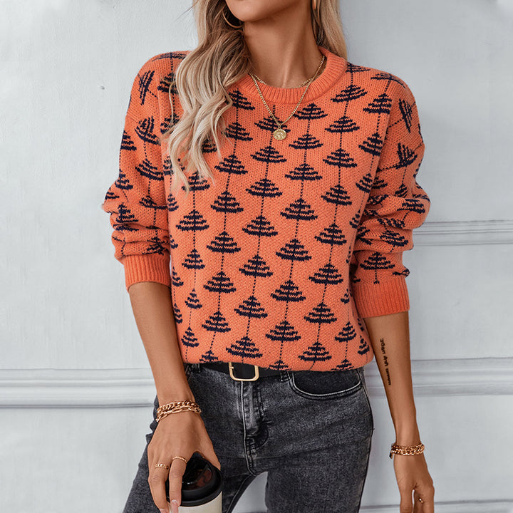 Damstickad tröja med lekfullt träddesign och mjukt material Mirla-Eva Jonsson
