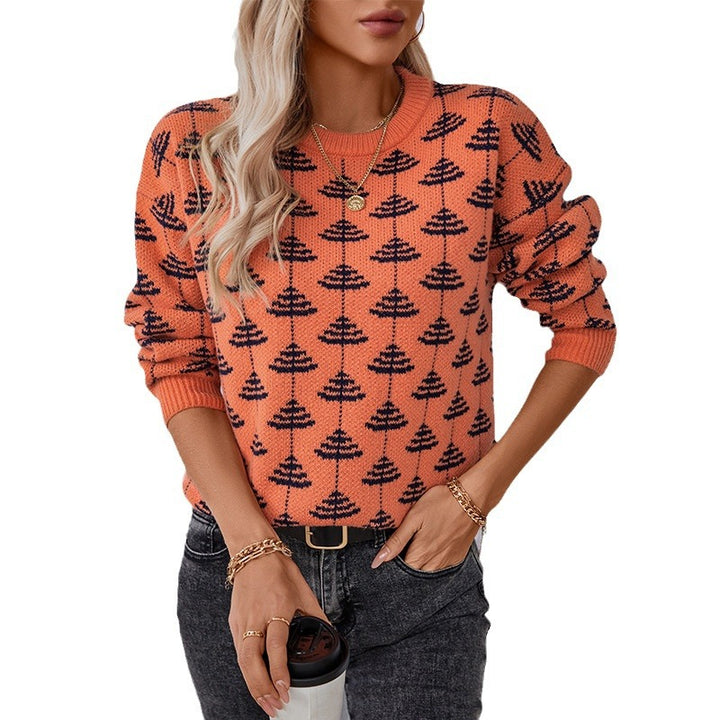 Damstickad tröja med lekfullt träddesign och mjukt material Mirla-Eva Jonsson