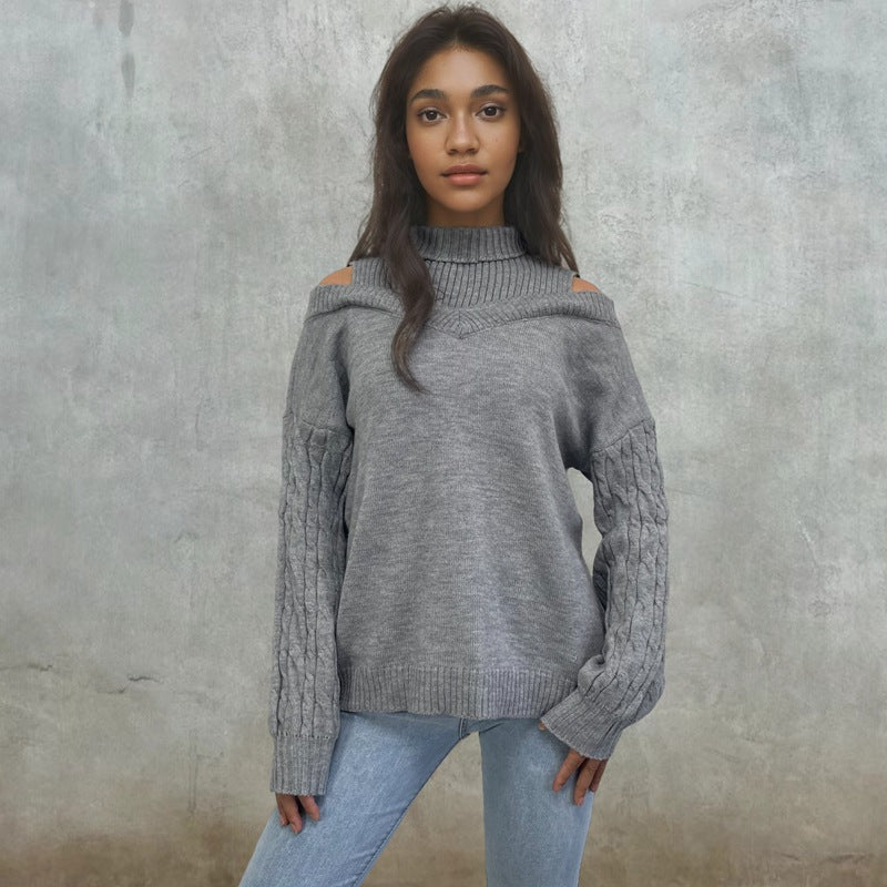 Damstickad tröja med off-shoulder-design och strukturerade ärmar Mirla-Eva Jonsson