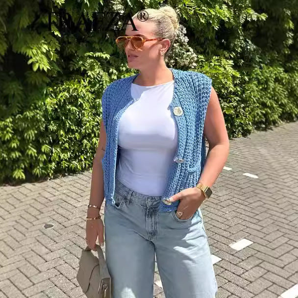 Damstickad väst med fickor och knapppartiet Eva Jonsson-Eva Jonsson