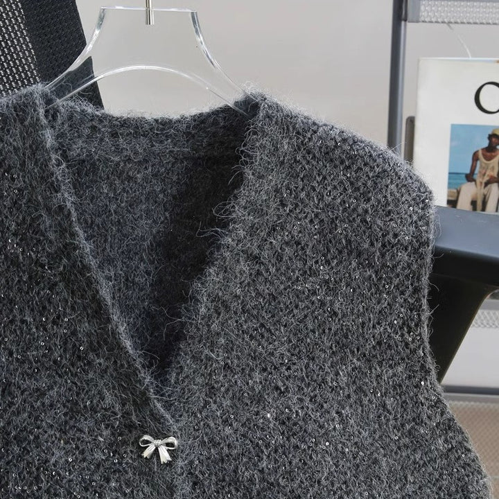 Damstickad väst med glimrande detaljer och dekorativa knappar Mirla-Eva Jonsson