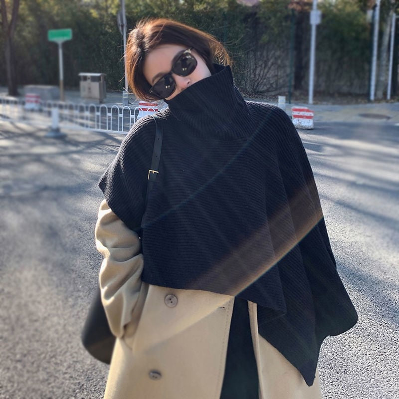 Damstickponcho med hög krage Mirla-Eva Jonsson