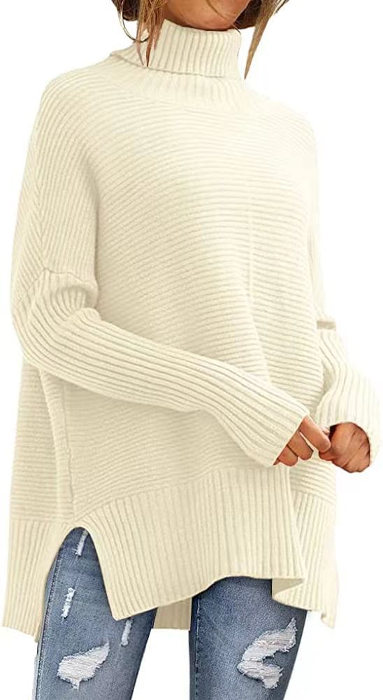Damstorlek L. Turtleneck-tröja med fin ribbstruktur och asymmetrisk skärning Mirla-Eva Jonsson