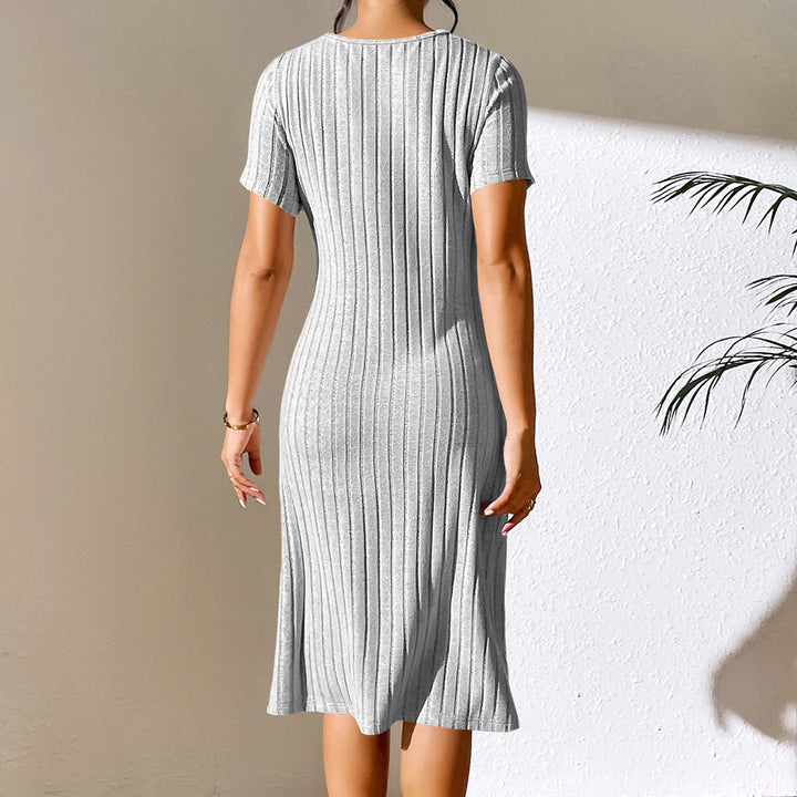 Damstrickklänning med modeaussnitt och elastiskt material Eva Jonsson-Eva Jonsson