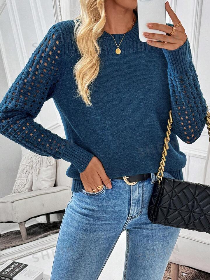 Damstricktröja med nätliknande ärmdesign Mirla-Eva Jonsson