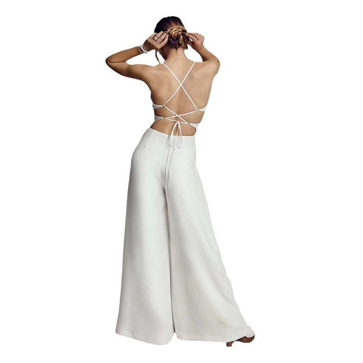Damsuit med Elegant V-ringning och Flödande Ben Mirla-Eva Jonsson