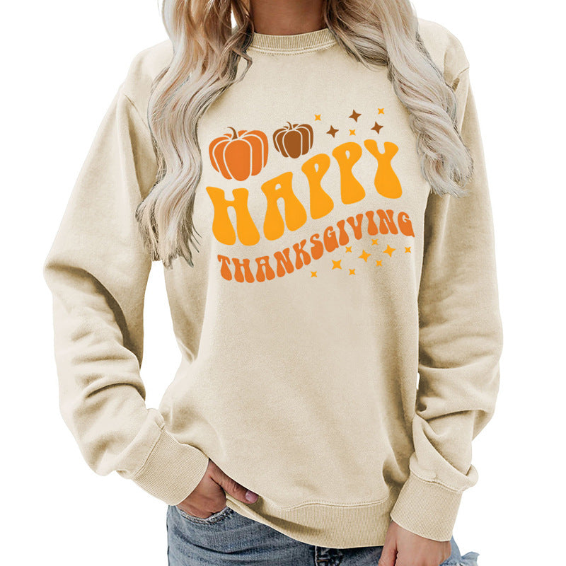 Damsweater med festligt pumpa-motiv och bekväm passform Mirla-Eva Jonsson