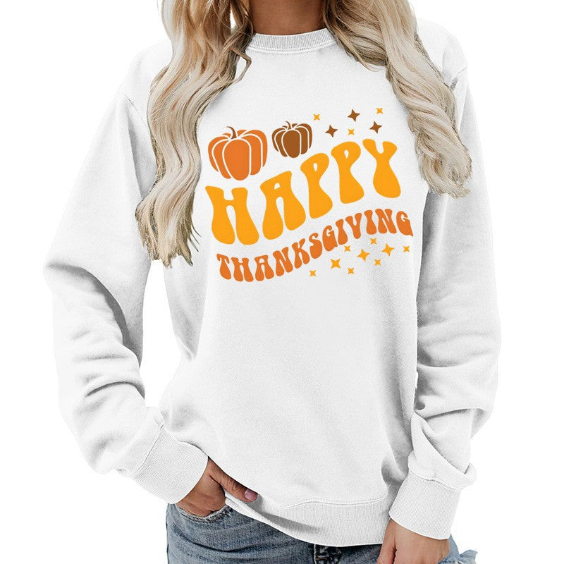 Damsweater med festligt pumpa-motiv och bekväm passform Mirla-Eva Jonsson