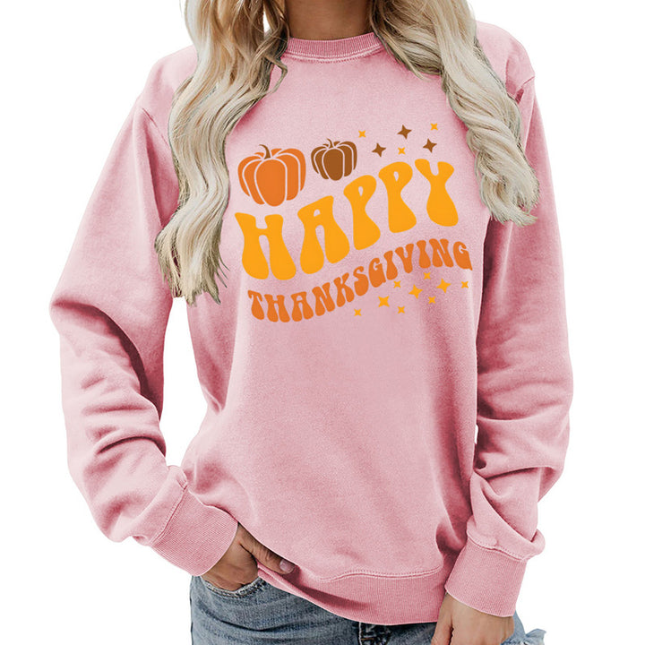 Damsweater med festligt pumpa-motiv och bekväm passform Mirla-Eva Jonsson