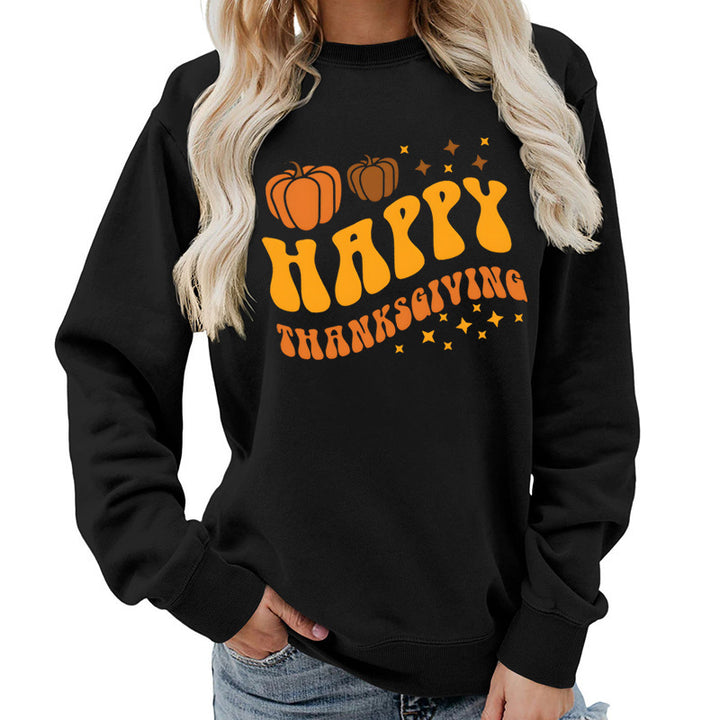 Damsweater med festligt pumpa-motiv och bekväm passform Mirla-Eva Jonsson