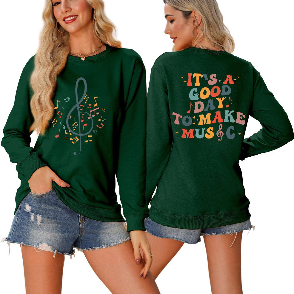 Damsweatshirt med musikaliskt motiv och kreativ text Mirla-Eva Jonsson