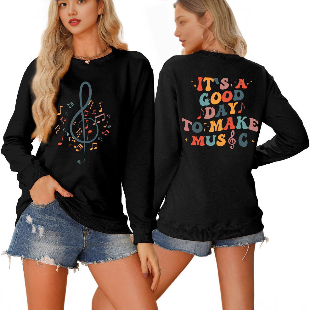 Damsweatshirt med musikaliskt motiv och kreativ text Mirla-Eva Jonsson
