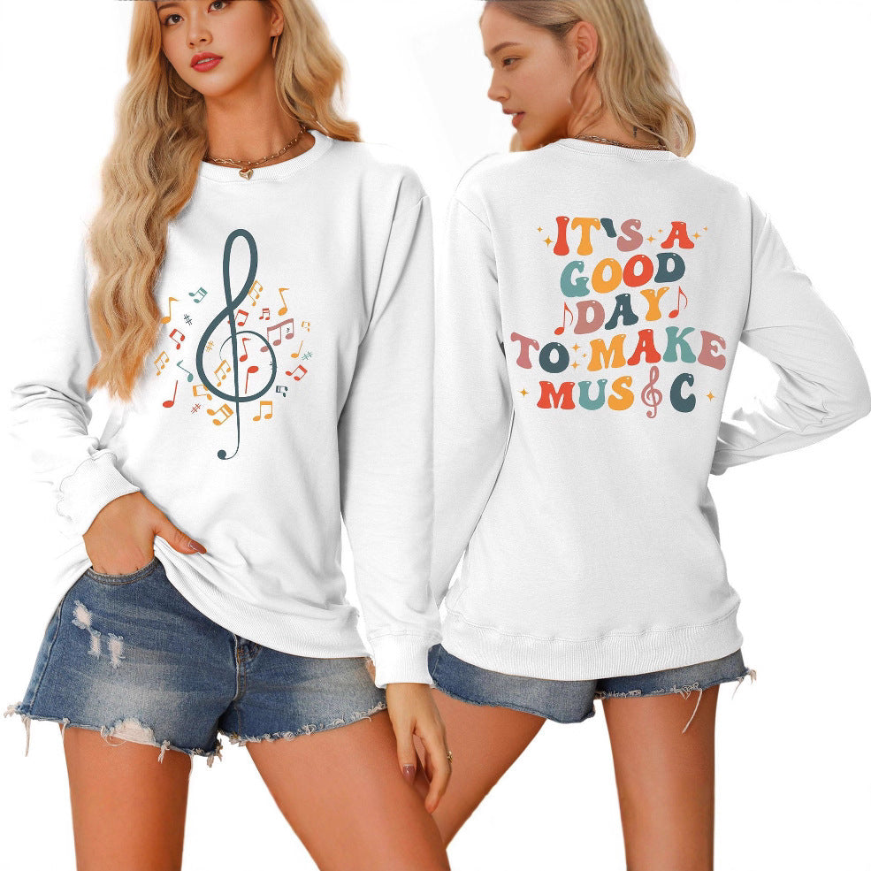 Damsweatshirt med musikaliskt motiv och kreativ text Mirla-Eva Jonsson