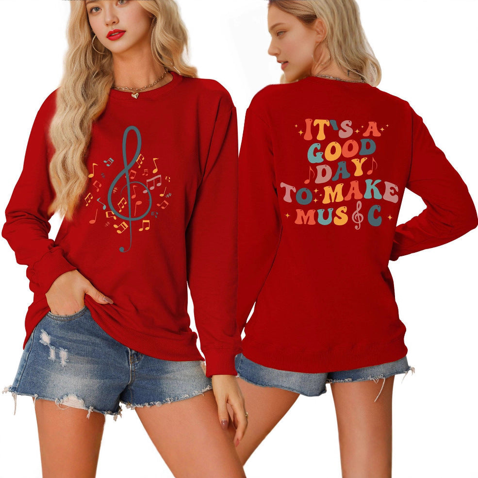 Damsweatshirt med musikaliskt motiv och kreativ text Mirla-Eva Jonsson