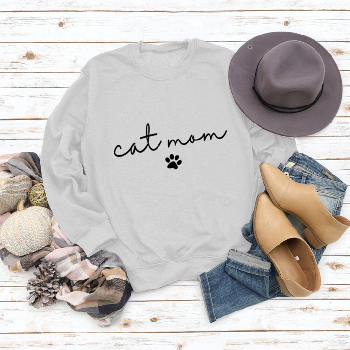 Damtröja med kreativ kattmamma-design Mirla-Eva Jonsson