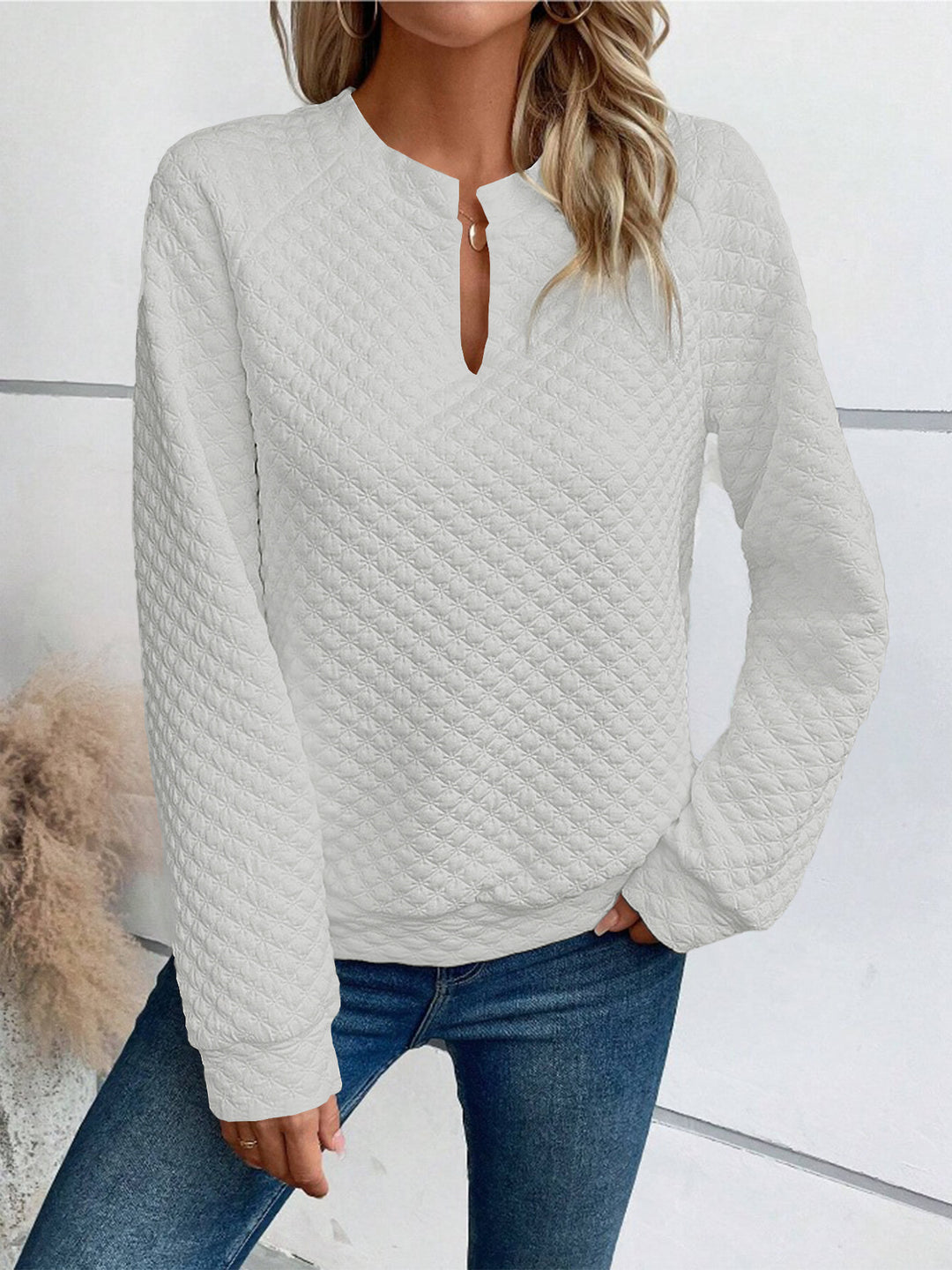 Damtröja med strukturerad design och elegant ståkrage Mirla-Eva Jonsson