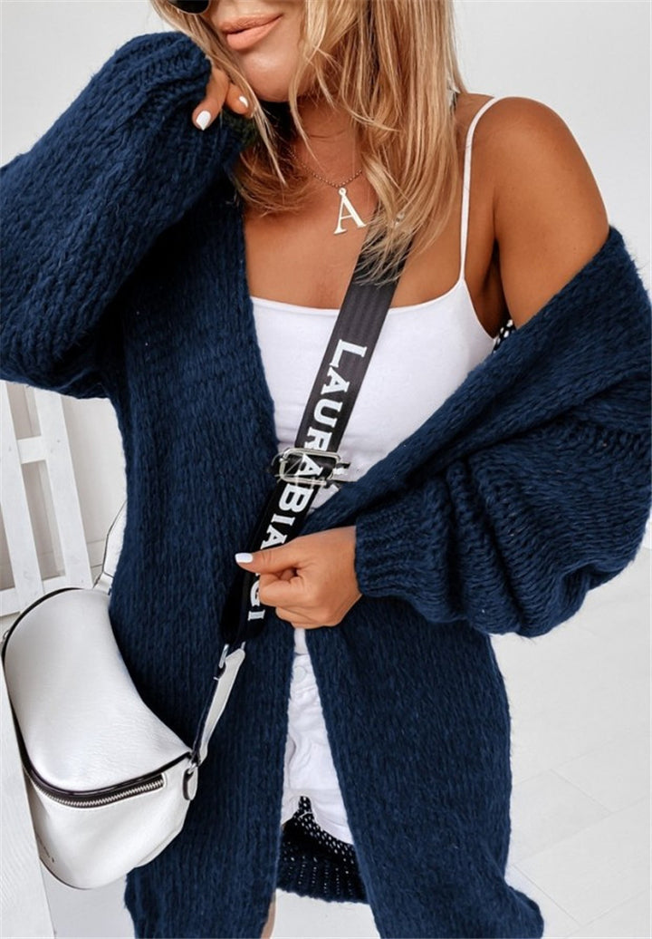Damvävd grov stickad cardigan med voluminösa ärmar och öppen front Mirla-Eva Jonsson