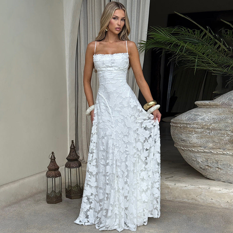 Elegant Kvällsklänning med Blommönster och Raffinerade Detaljer för Fest | Mirla-Eva Jonsson