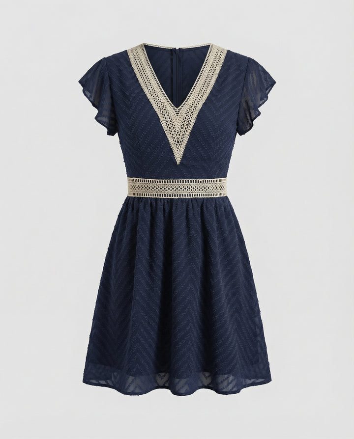 Elegant Sommarklänning med Ärmlös Design och Knytdetalj bak för Sommarfester | Eva Jonsson-Eva Jonsson