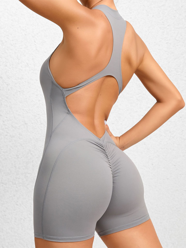 Mirla | Åtsittande dragkedje-sport-yoga-byxor persikohöfter enhetstights snabbtorkande plisserad fitness-jumpsuit-Eva Jonsson