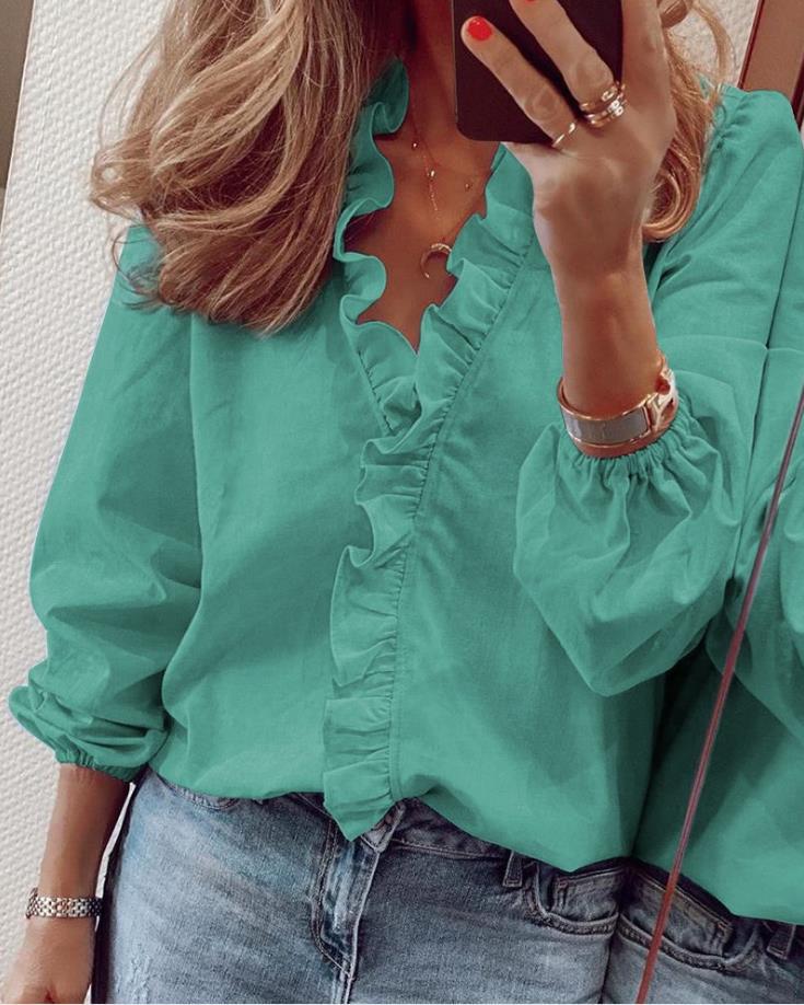 Mirla | Blus med volanger och V-hals-Eva Jonsson