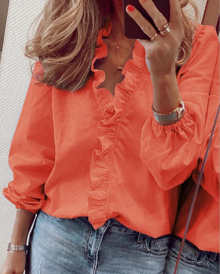 Mirla | Blus med volanger och V-hals-Eva Jonsson