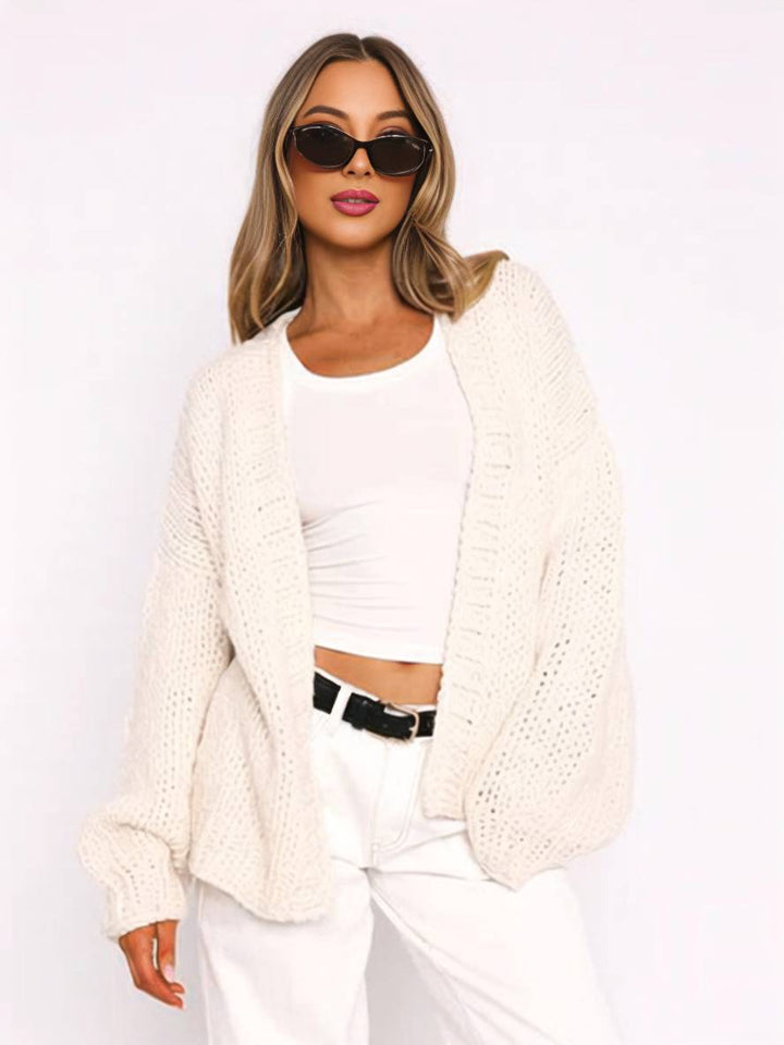 Mirla | Cardigan i Grovstick enfärgad med nedhasade axlar långärmad dam elegant avslappnad vid oversized blus-Eva Jonsson