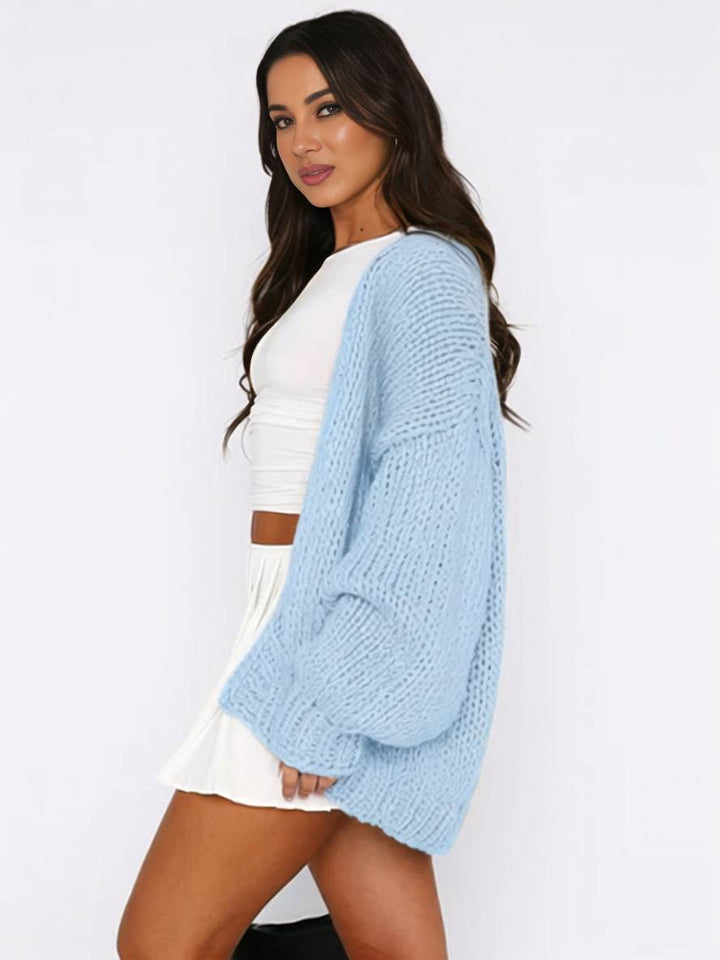 Mirla | Cardigan i Grovstick enfärgad med nedhasade axlar långärmad dam elegant avslappnad vid oversized blus-Eva Jonsson
