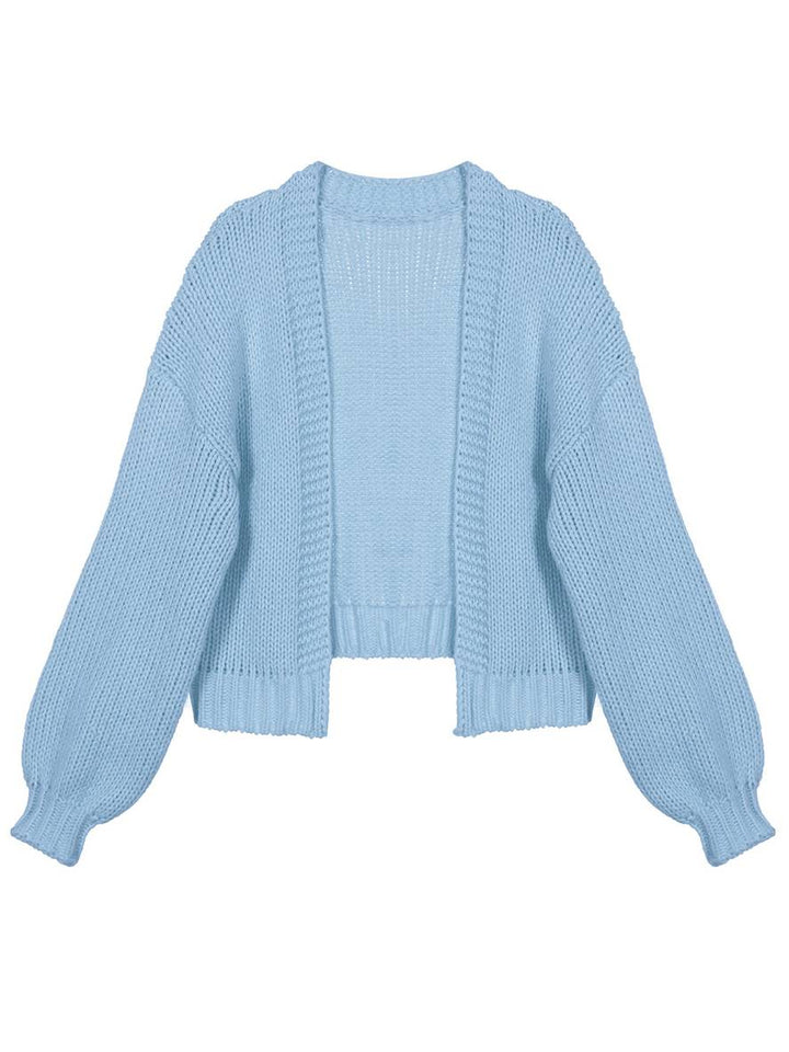 Mirla | Cardigan i Grovstick enfärgad med nedhasade axlar långärmad dam elegant avslappnad vid oversized blus-Eva Jonsson