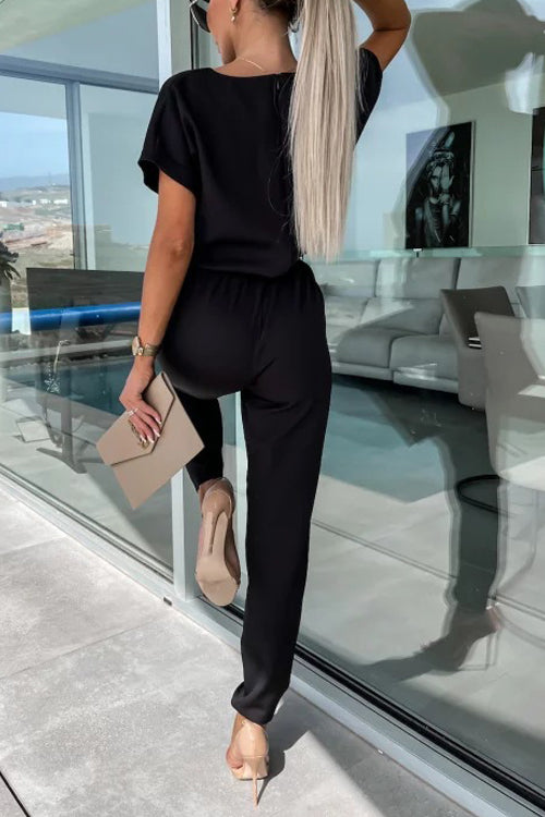 Mirla | Elegant keyhole jumpsuit med bälte för damer-Eva Jonsson