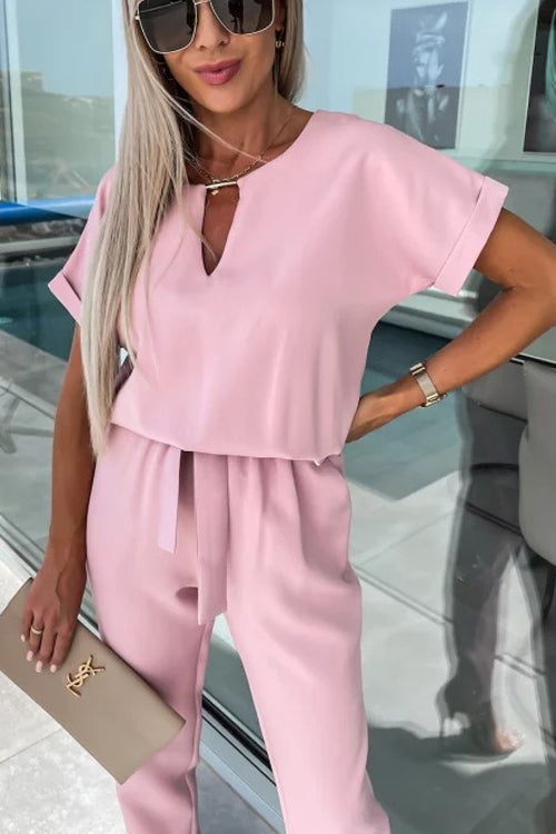 Mirla | Elegant keyhole jumpsuit med bälte för damer-Eva Jonsson