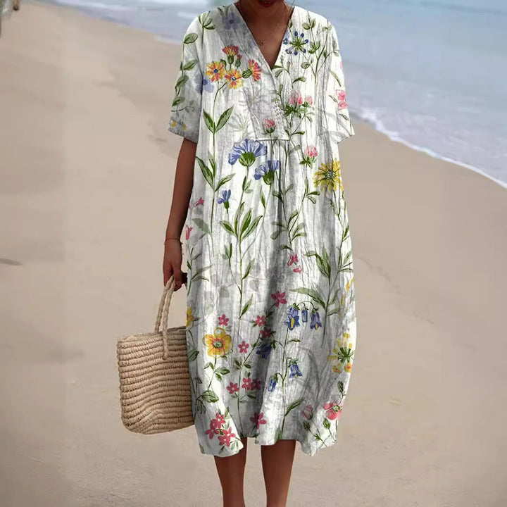 Mirla | Färggalad sommarklänning med blommor-Eva Jonsson