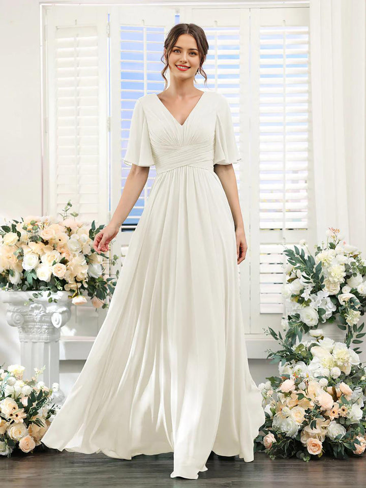 Eva Jonsson | Flödande V-ringad chiffongklänning för damer-Eva Jonsson