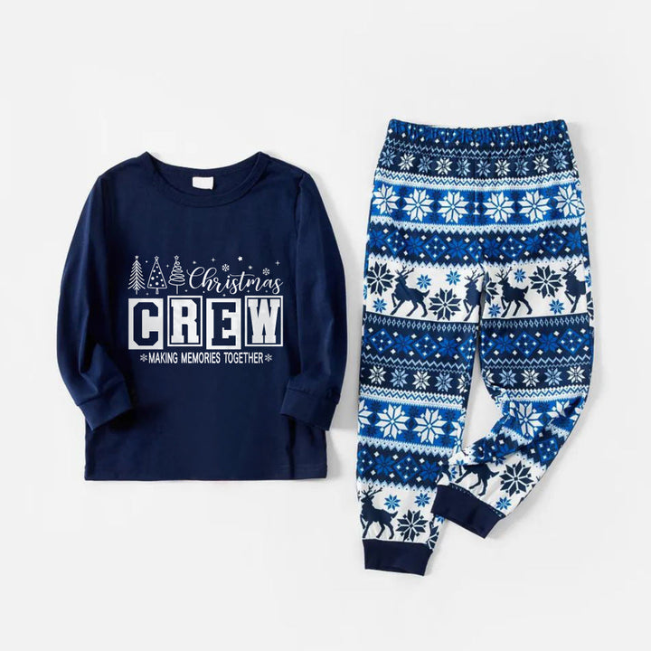 Mirla | Glad Blå Julpyjamas-Set med Jultomte Gör Minnen Tillsammans Tryck-Eva Jonsson