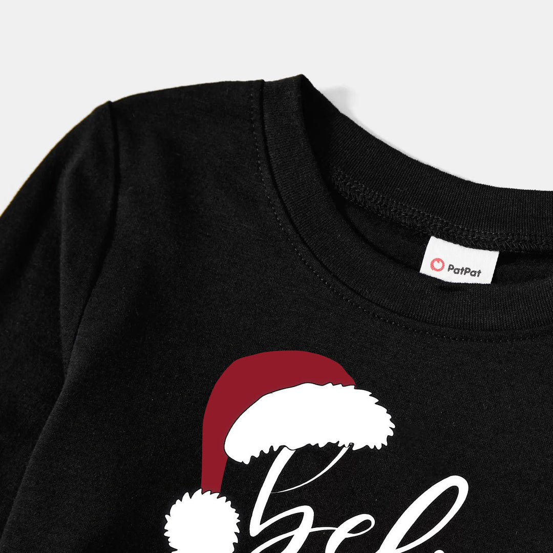 Eva Jonsson | Julmössa och 'Believe' Bokstavstryckt Mönstrat Svart-Vitt Rutigt Pyjamas-Set-Eva Jonsson