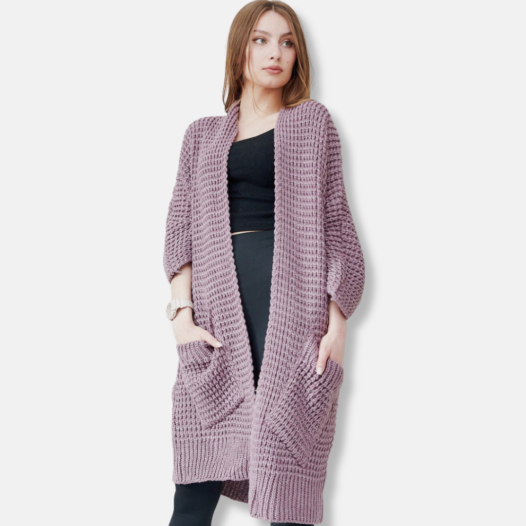 Mirla | Kappa av stickad oversized passform öppen front mönstrade fickor ribbade kanter-Eva Jonsson