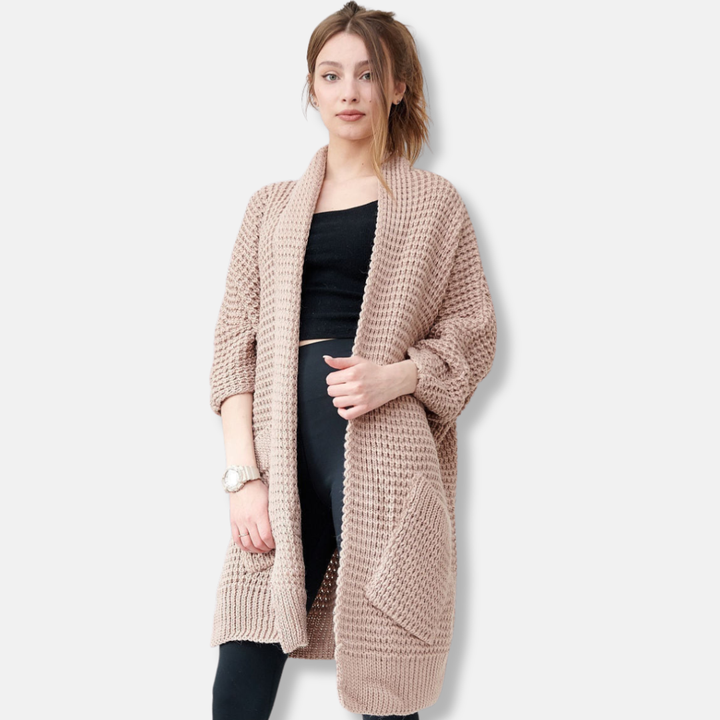 Mirla | Kappa av stickad oversized passform öppen front mönstrade fickor ribbade kanter-Eva Jonsson