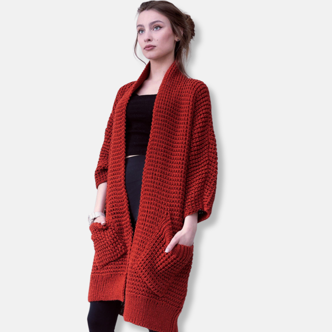 Mirla | Kappa av stickad oversized passform öppen front mönstrade fickor ribbade kanter-Eva Jonsson