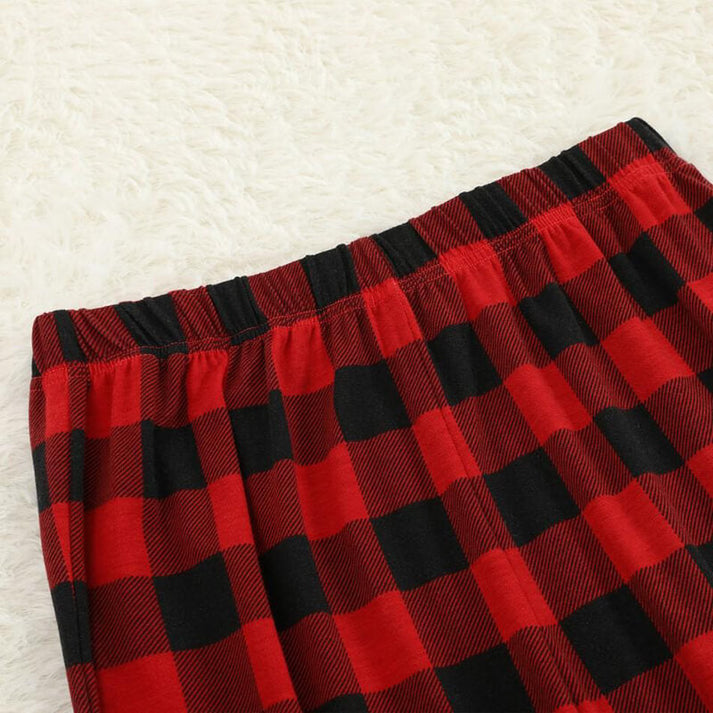 Eva Jonsson | Röda och Svarta Rutiga Julpyjamas med Julsemestertext-Eva Jonsson