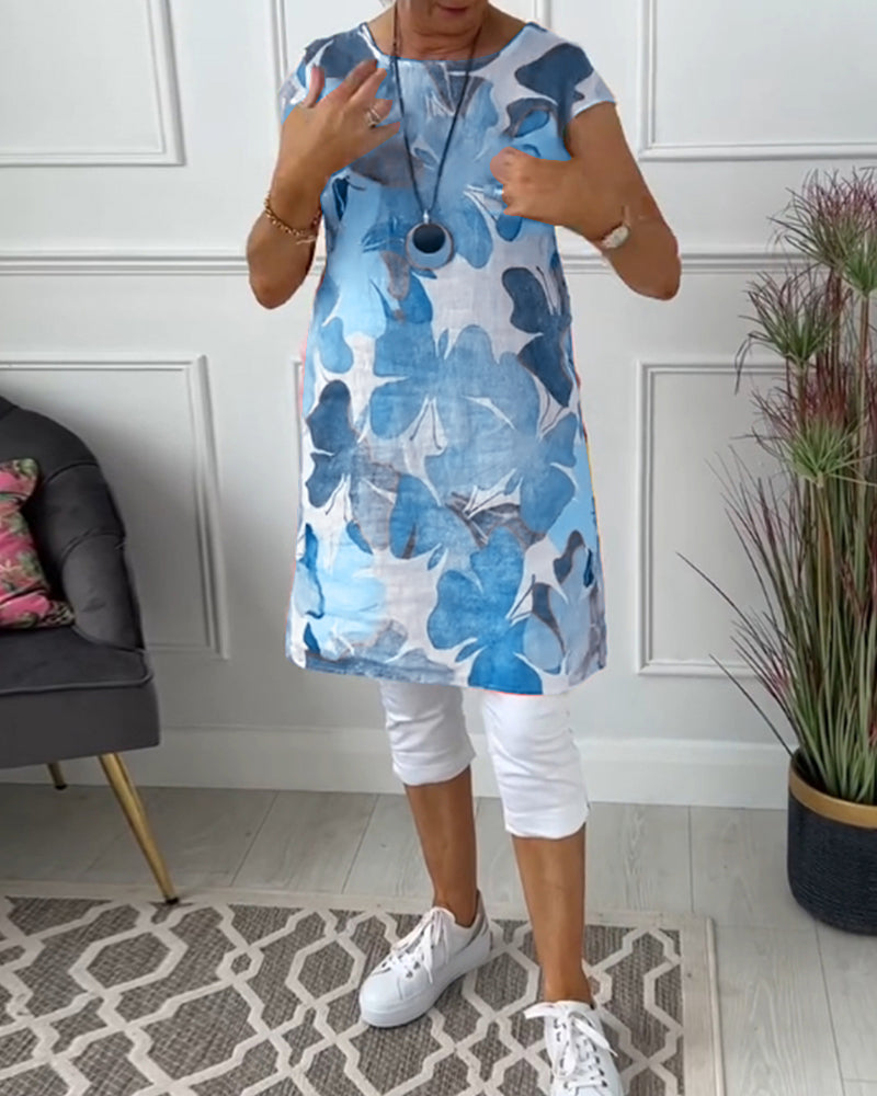 Mirla | Slapp lång topp med färgglad blommig tryck-Eva Jonsson