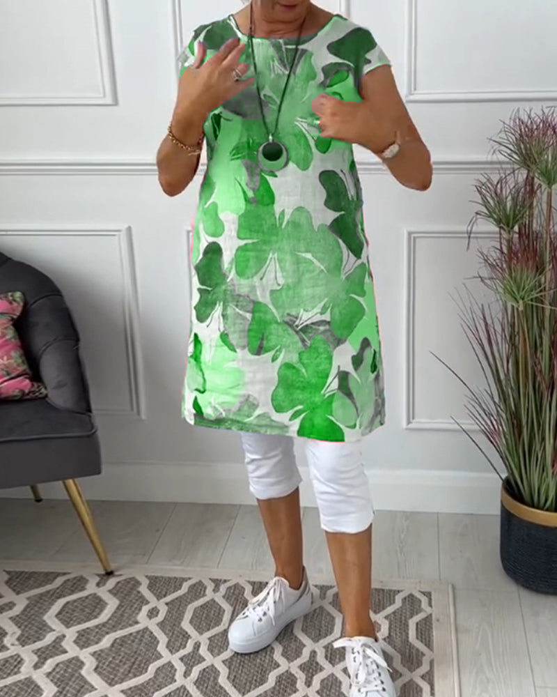 Mirla | Slapp lång topp med färgglad blommig tryck-Eva Jonsson