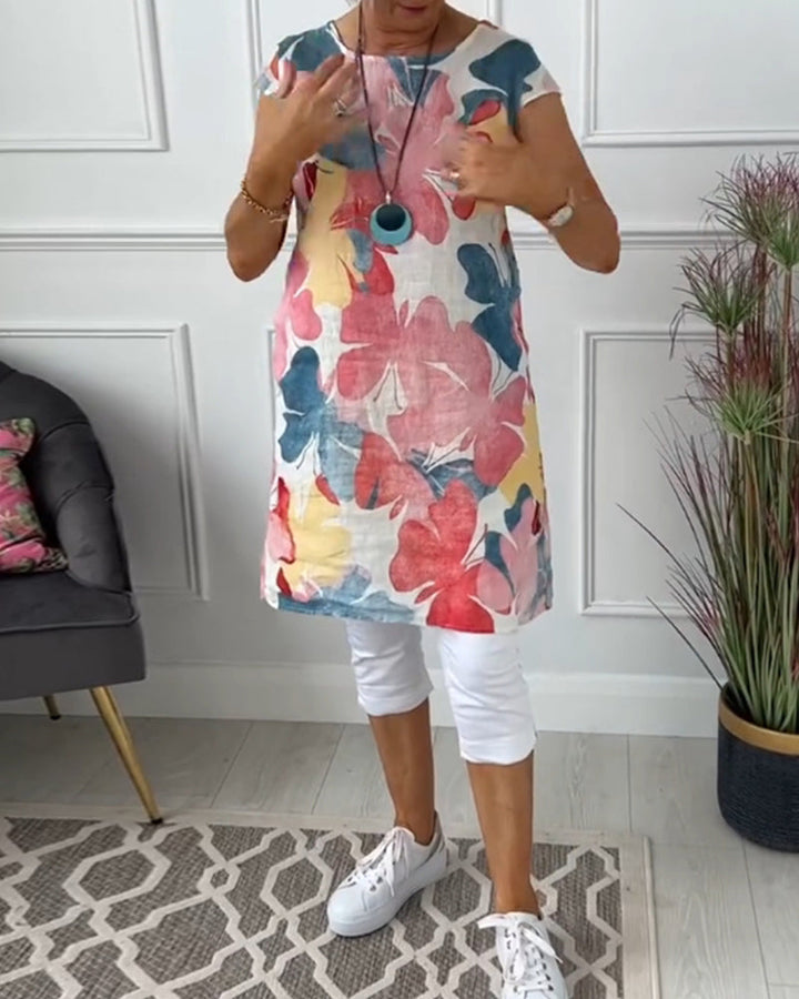 Mirla | Slapp lång topp med färgglad blommig tryck-Eva Jonsson