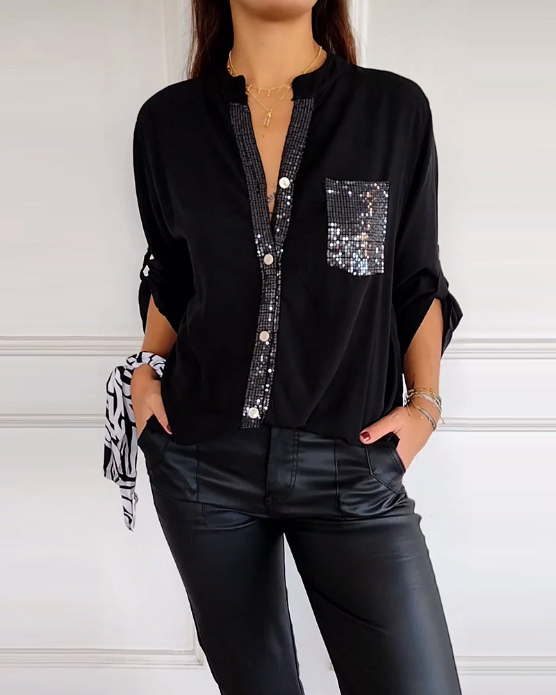 Mirla | Snygg blus med knapplist och paljettdetaljer för damer Elegant långärmad blus med paljettficka-Eva Jonsson
