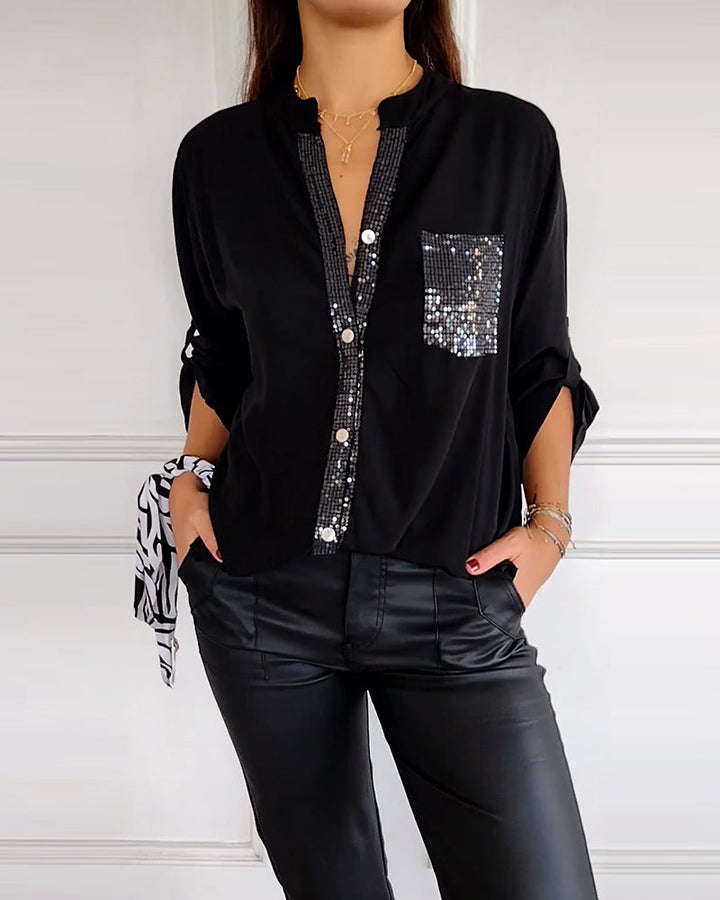 Mirla | Snygg blus med knapplist och paljettdetaljer för damer Elegant långärmad blus med paljettficka-Eva Jonsson